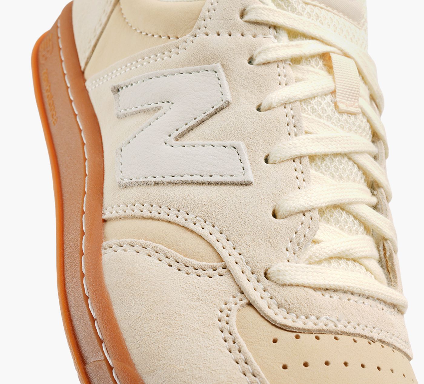 NEW BALANCE T500 en BEIGE vue 1b